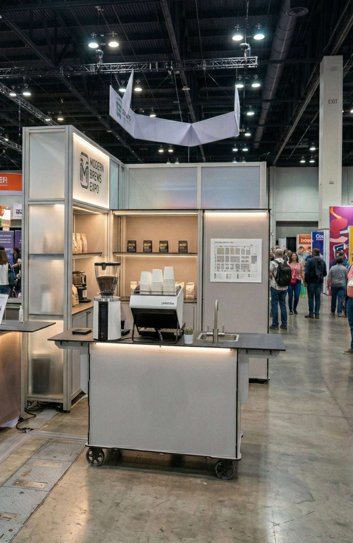 Custom-built espresso bar booth with display shelving on a trade show floor