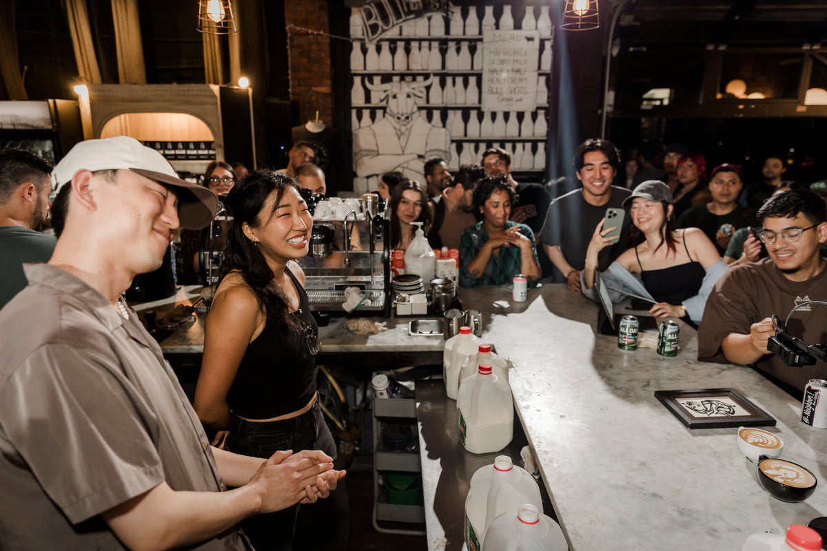 Crowd gathered around the bar at the ESOM latte art throwdown at Sweetleaf, New York, 2025